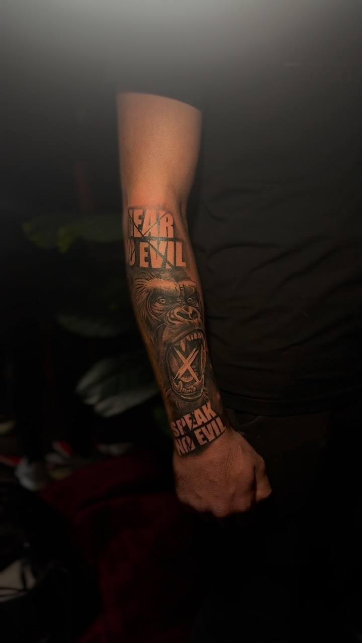 Gorilla and lettering forearm piece